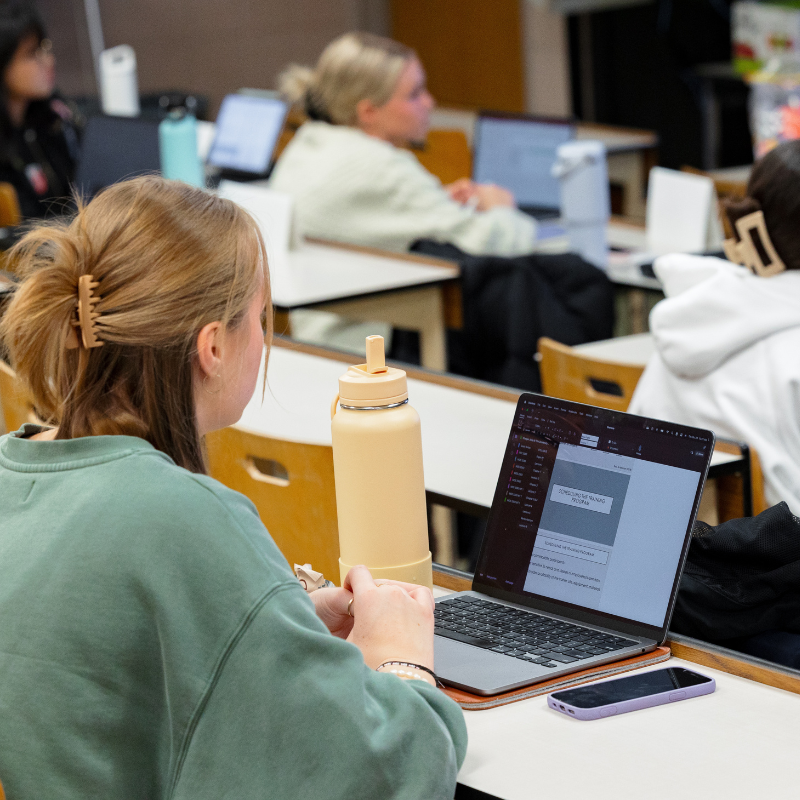 A student sitting in a lecture
