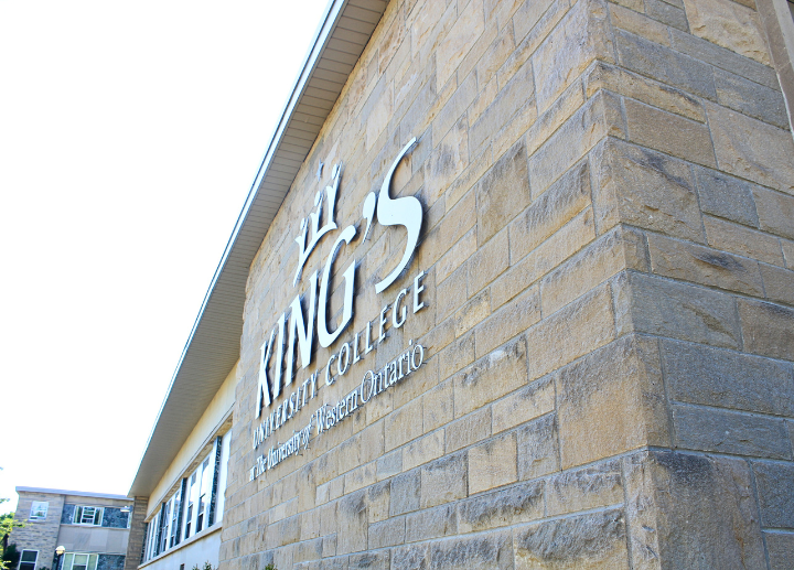 A photo of an enternace sign on Kings campus