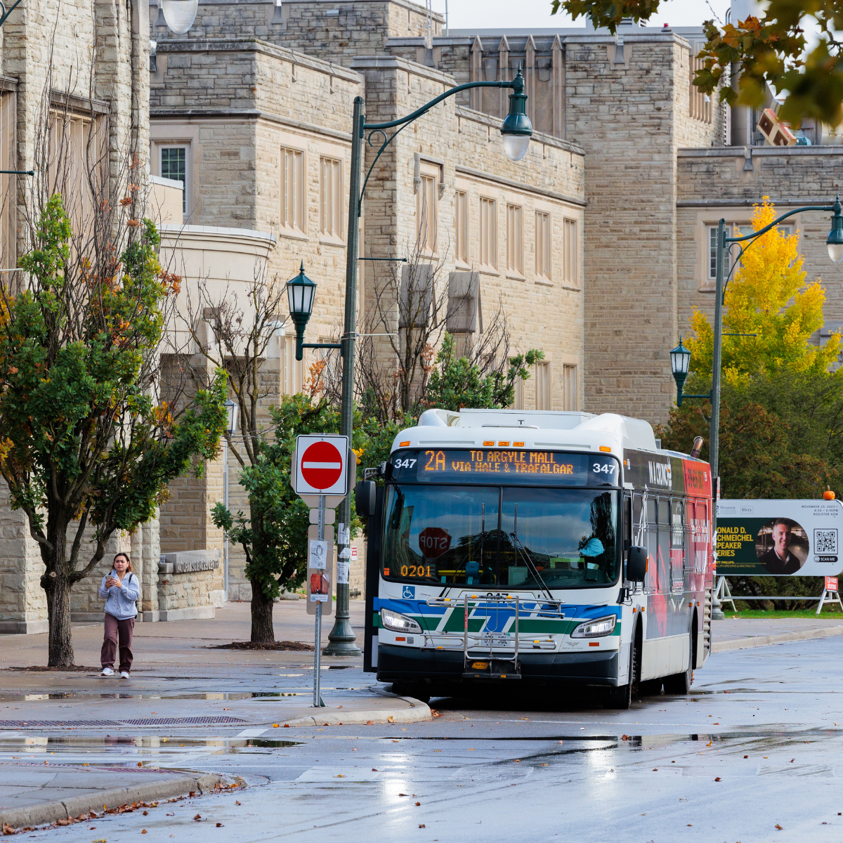 A photo of an LTC bus at a bus stop on campus